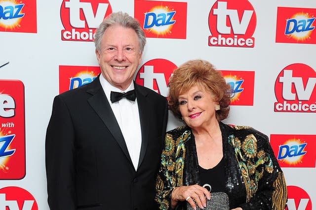 <p>Philip Lowrie (left) and Barbara Knox (right) at the TV Choice Awards in London (Ian West/PA)</p>