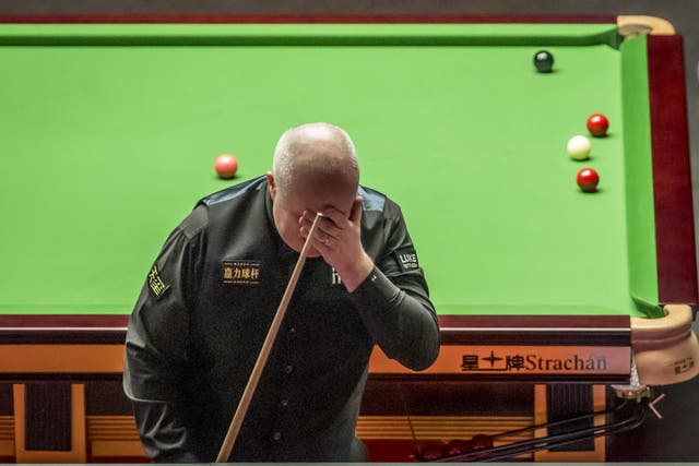 John Higgins will have to wait to clinch his quarter-final spot (Danny Lawson/PA)