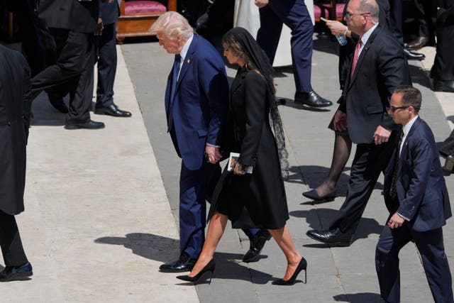 <p>President Donald Trump and first lady Melania Trump leave at the end of the funeral of Pope Francis in St. Peter's Square at the Vatican</p>