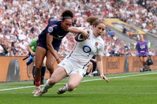<p>Abby Dow of England scores her team's first try during the Guinness Women's Six Nations 2025 match between England and France at Allianz Stadium</p>