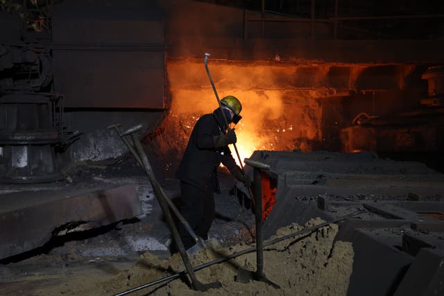 <p>A steel worker at one of the blast furnaces at the British Steel site in Scunthorpe, North Lincolnshire </p>