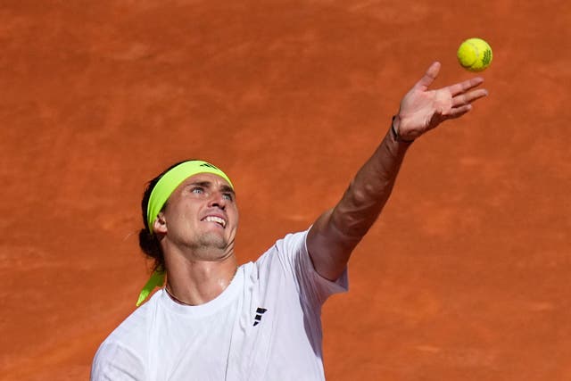 Alexander Zverev took a picture of a ball mark after being incensed at a call during his win over Alejandro Davidovich Fokina (Manu Fernandez/AP)