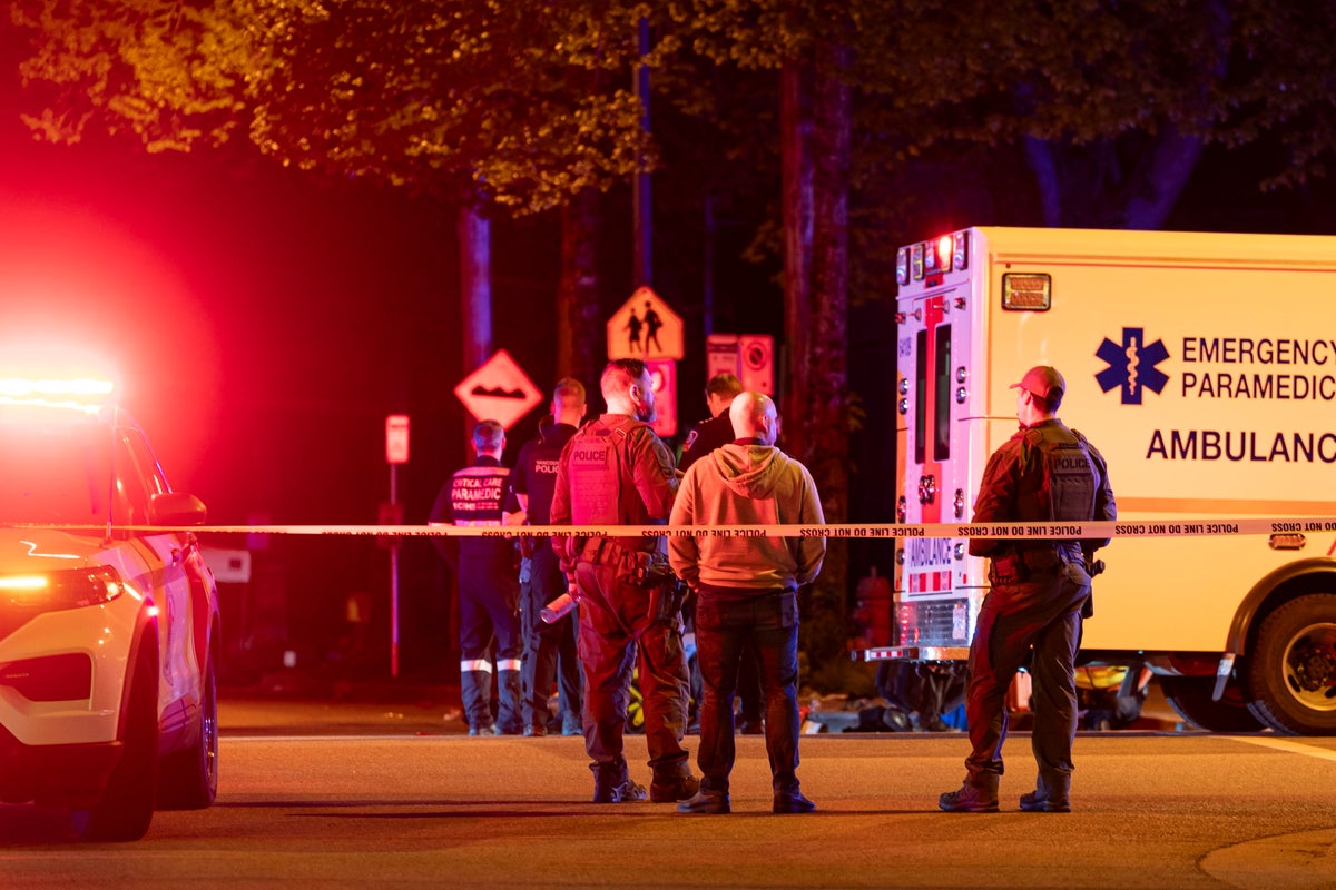 Nine people dead and several injured after car drives into crowd at Vancouver street festival