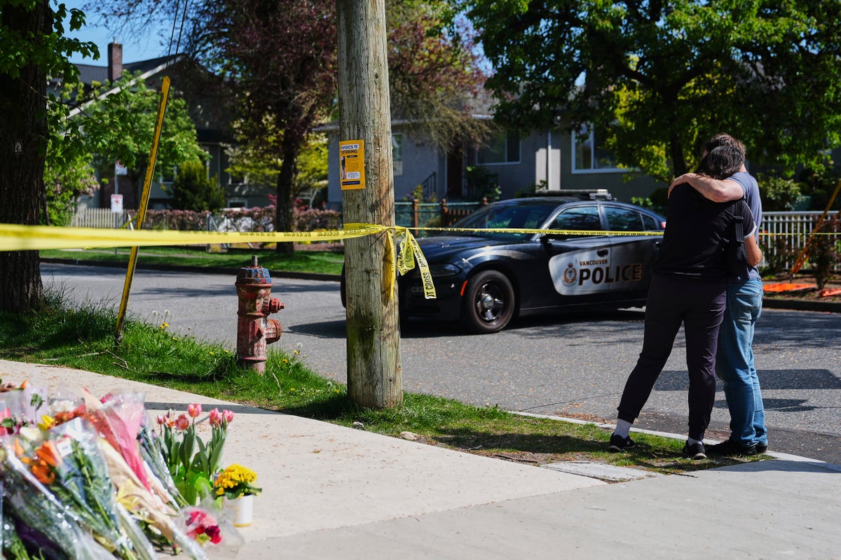 AP PHOTOS: A vehicle plows into a Filipino street festival crowd in Vancouver
