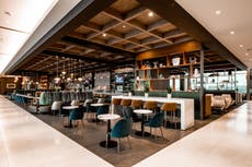 Soccer field-sized airport lounge opens at world’s busiest airport
