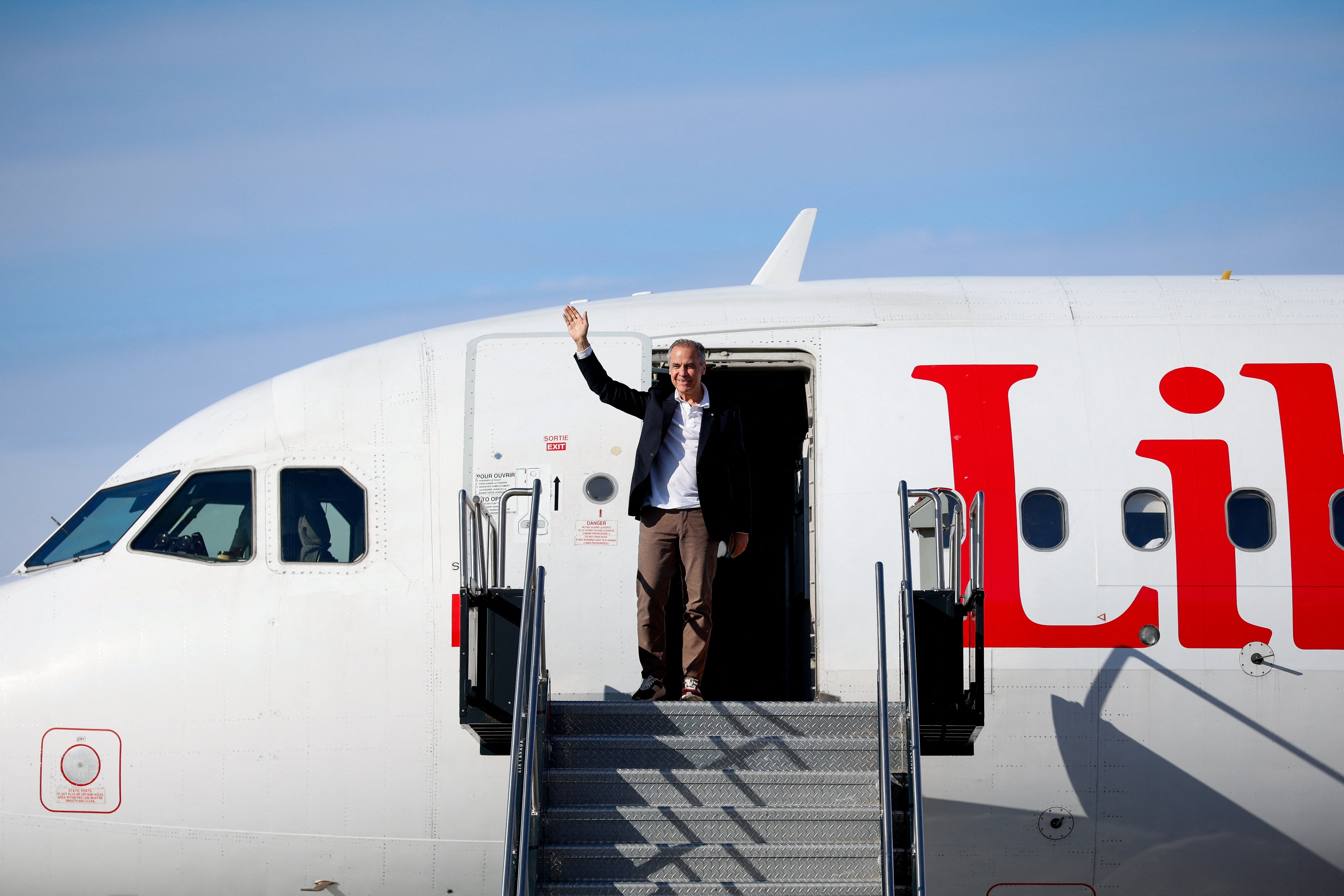 Prime Minister Mark Carney arrives in Ottawa on election day