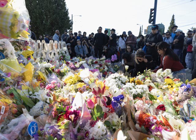 <p>People attend a candlelight vigil near the scene where a car drove into a crowd at the Lapu Lapu Festival on 27 April 2025 in Vancouver, Canada</p>