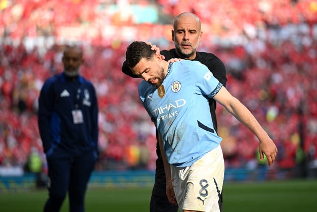 <p>Mateo Kovacic is congratulated by Pep Guardiola after being substituted</p>