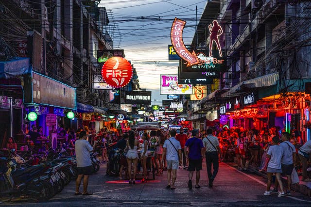 <p>File. People walk in Pattaya, Thailand</p>