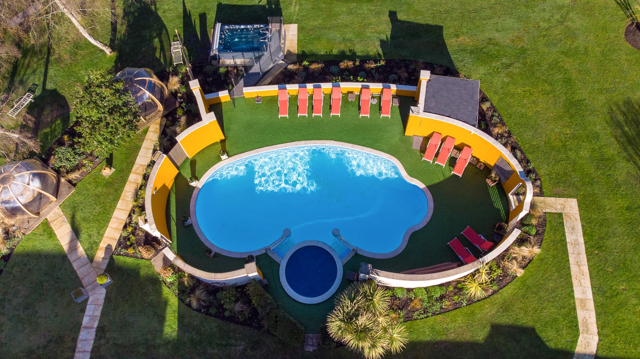 Bishopstrow Hotel & Spa’s quirky pool area looks like it was plucked right out of Malibu in the 1960s rather than being based in Bath