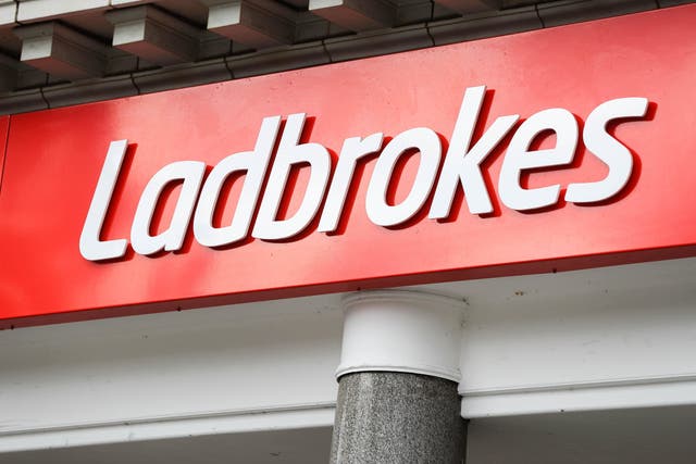Entain owns Ladbrokes, Coral and BetMGM (Mike Egerton/PA)