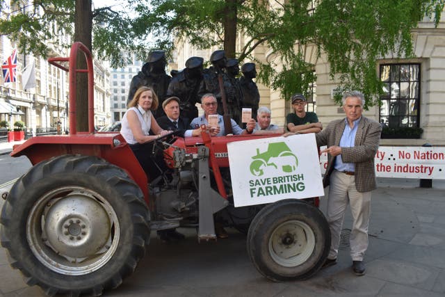 People at a Save British Farming protest in London amid concerns for the UK’s food security (Eric Williams/PA)