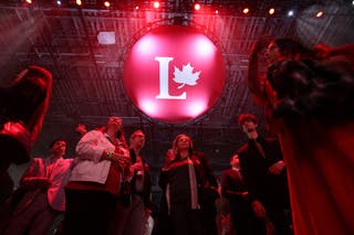 Supporters for Canada's prime minister and Liberal Party of Canada leader Mark Carney gather at a watch election party in Ottawa, Canada on 28 April 2025