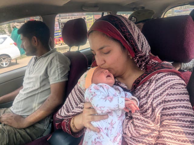 <p>Sara Khan, a Pakistani woman married to an Indian citizen, prepares to leave her newborn behind</p>