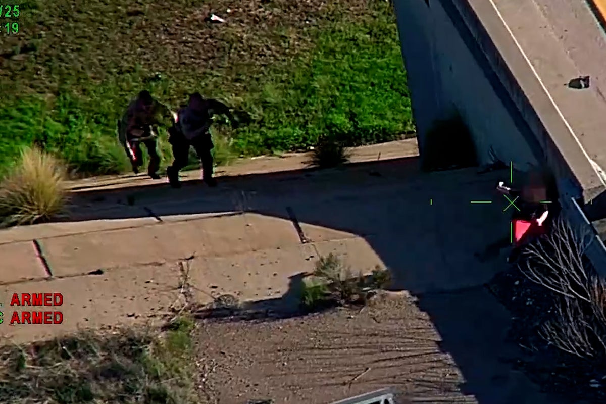 Heart-stopping moment police rescue 11-year-old autistic boy after he wandered on to freeway