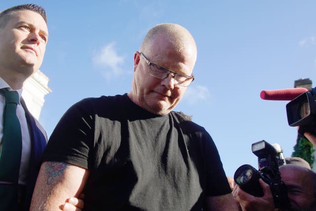 Richard Satchwell (centre) leaving the District Court in Cashel, Co Tipperary, after being charged in connection with the murder of his wife Tina Satchwell (Brian Lawless/PA)
