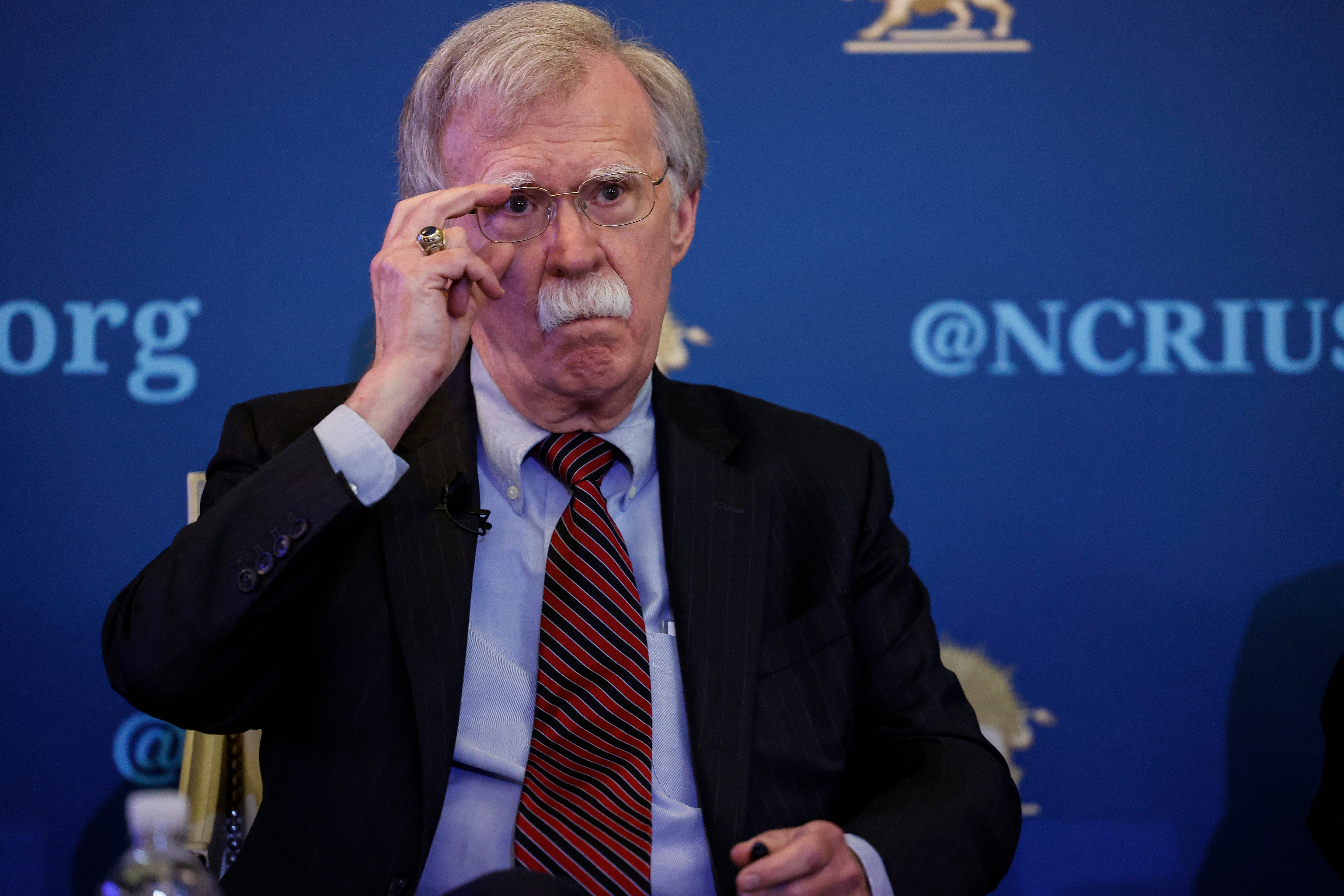 John Bolton lambasted Pete Hegseth for his use of the messaging app Signal, arguing that he should leave the Pentagon
