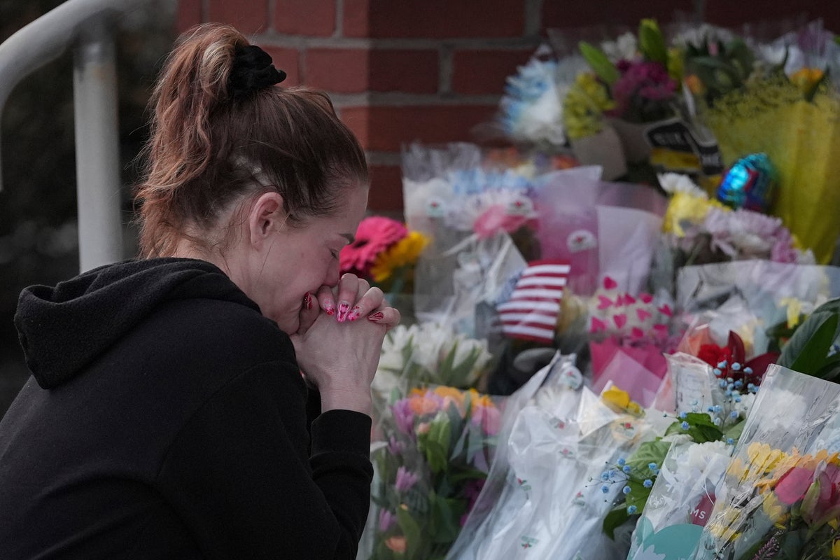 Prosecutor says officer killed in gunmans Pennsylvania hospital attack was hit by fire from police