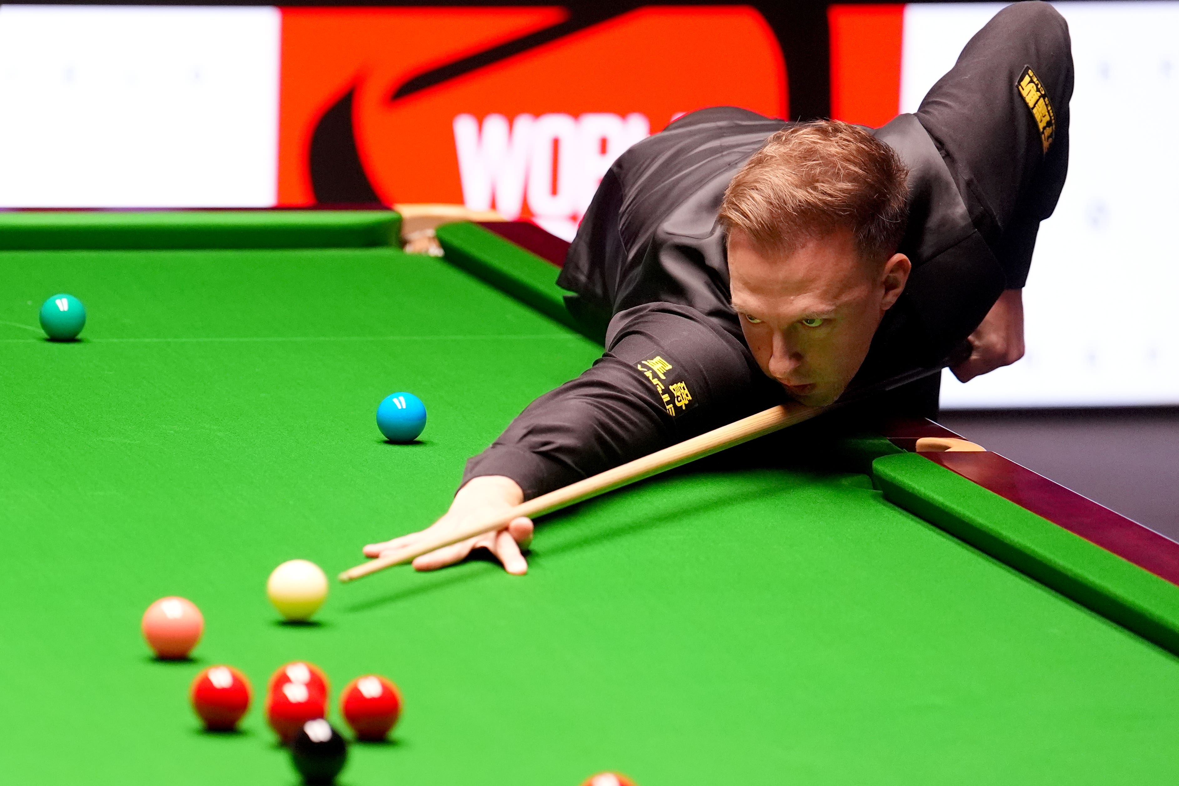Judd Trump wrapped up a 13-8 win over Luca Brecel
