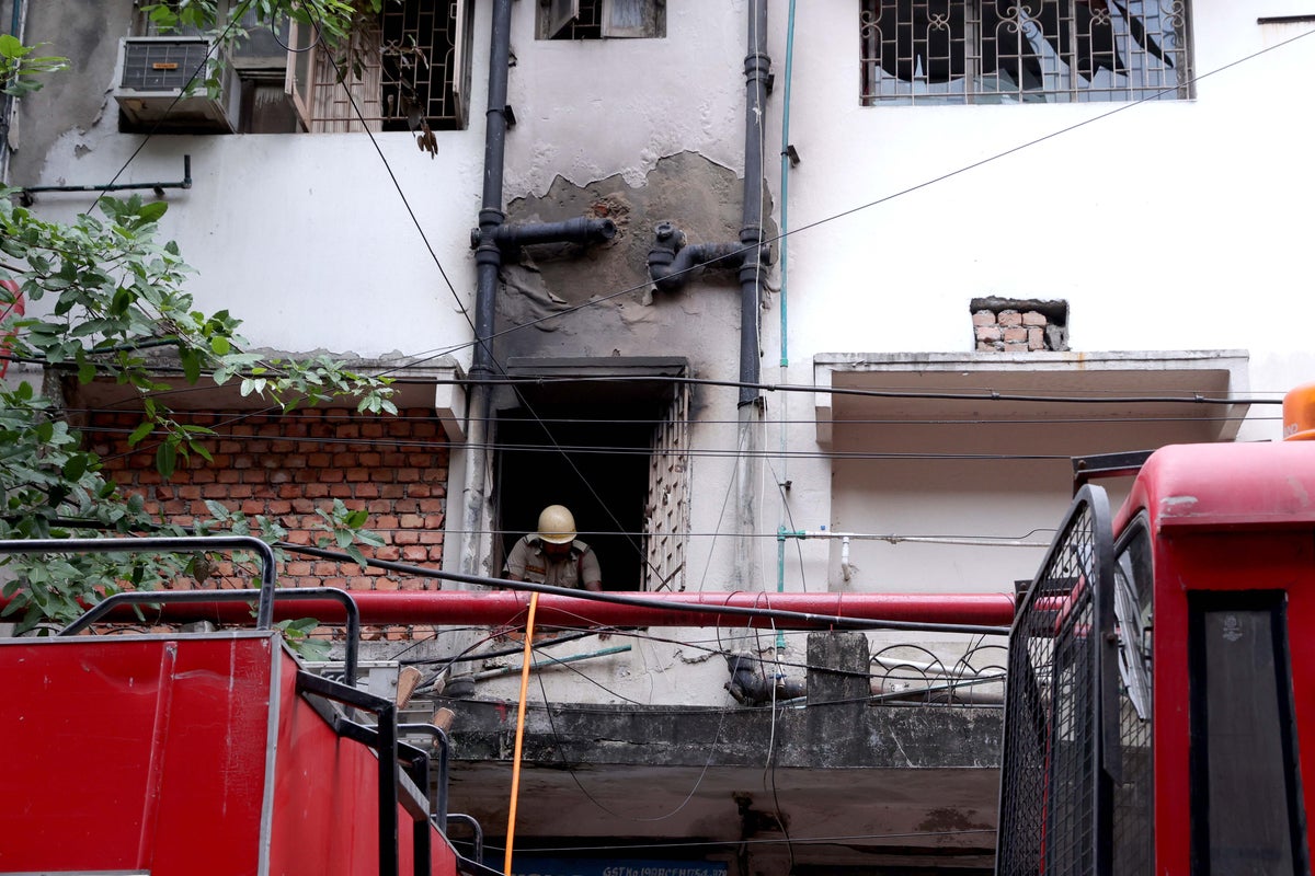 Two children among 15 dead as fire engulfs six-storey hotel in India