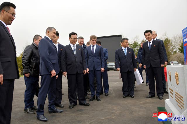 <p>In this photo provided by the North Korean government, officials from North Korean and Russia stand in front of a monument to mark a ground-breaking ceremony for the construction of a bridge between the two countries, in Rason Municipality, North Kora Wednesday, April 30, 2025</p>