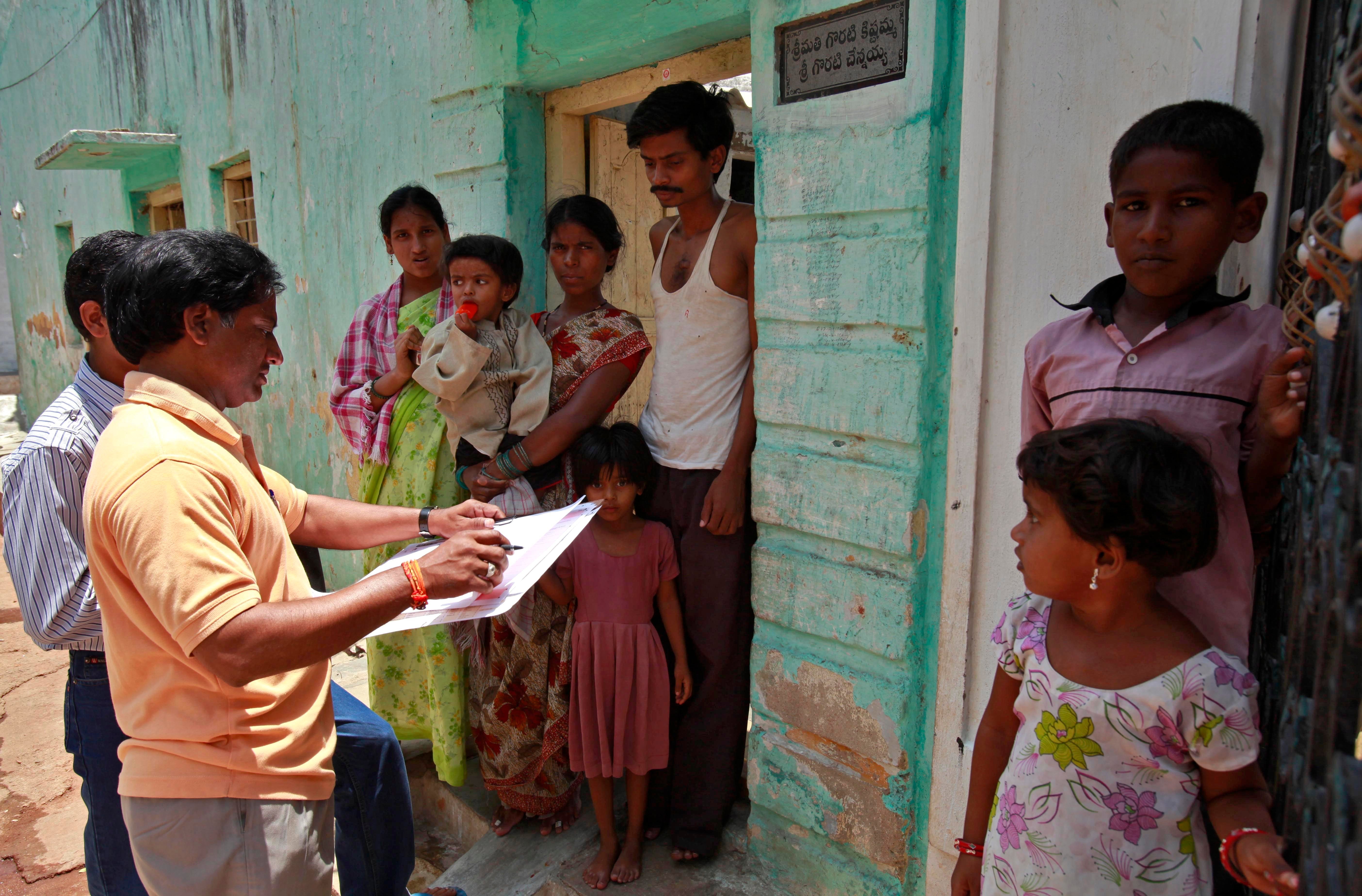 File. A census officer collects details of a family in Hyderabad, India, in 2010