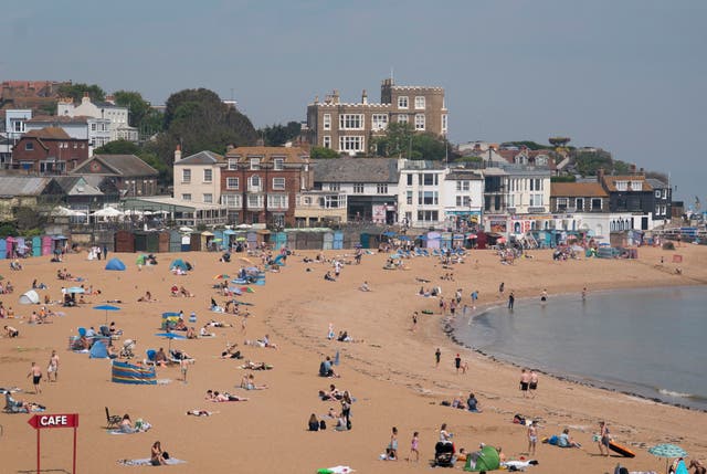 <p>People enjoy the beach in Broadstairs, Kent, on May 1</p>