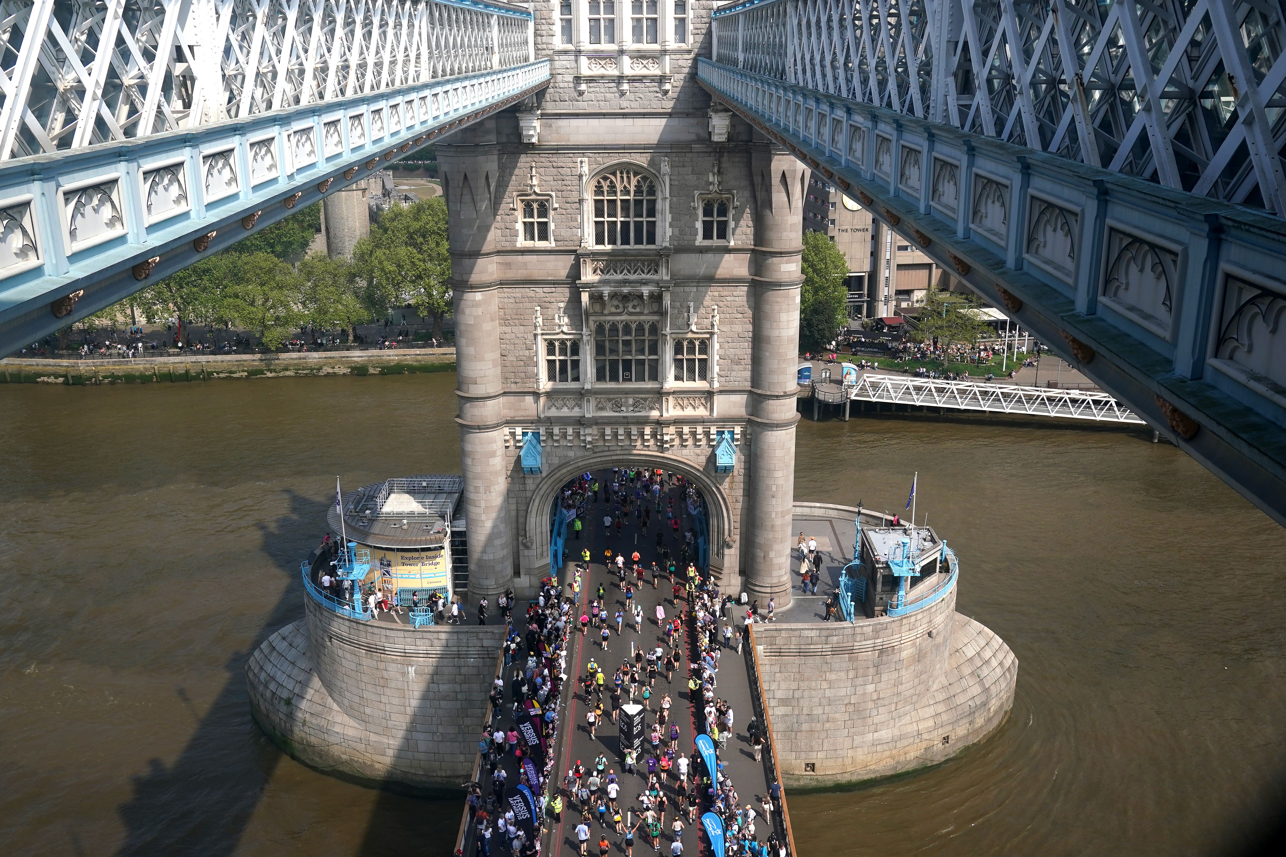 The mass participation race on Tower Bridge during the TCS London Marathon (Jonathan Brady/PA)