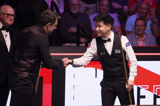 Ronnie O’Sullivan was drawing 4-4 with Zhao Xintong (Richard Sellers/PA)