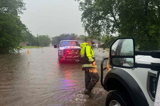 <p>Two people have drowned in Oklahoma floodwaters after getting trapped in their cars during storms</p>