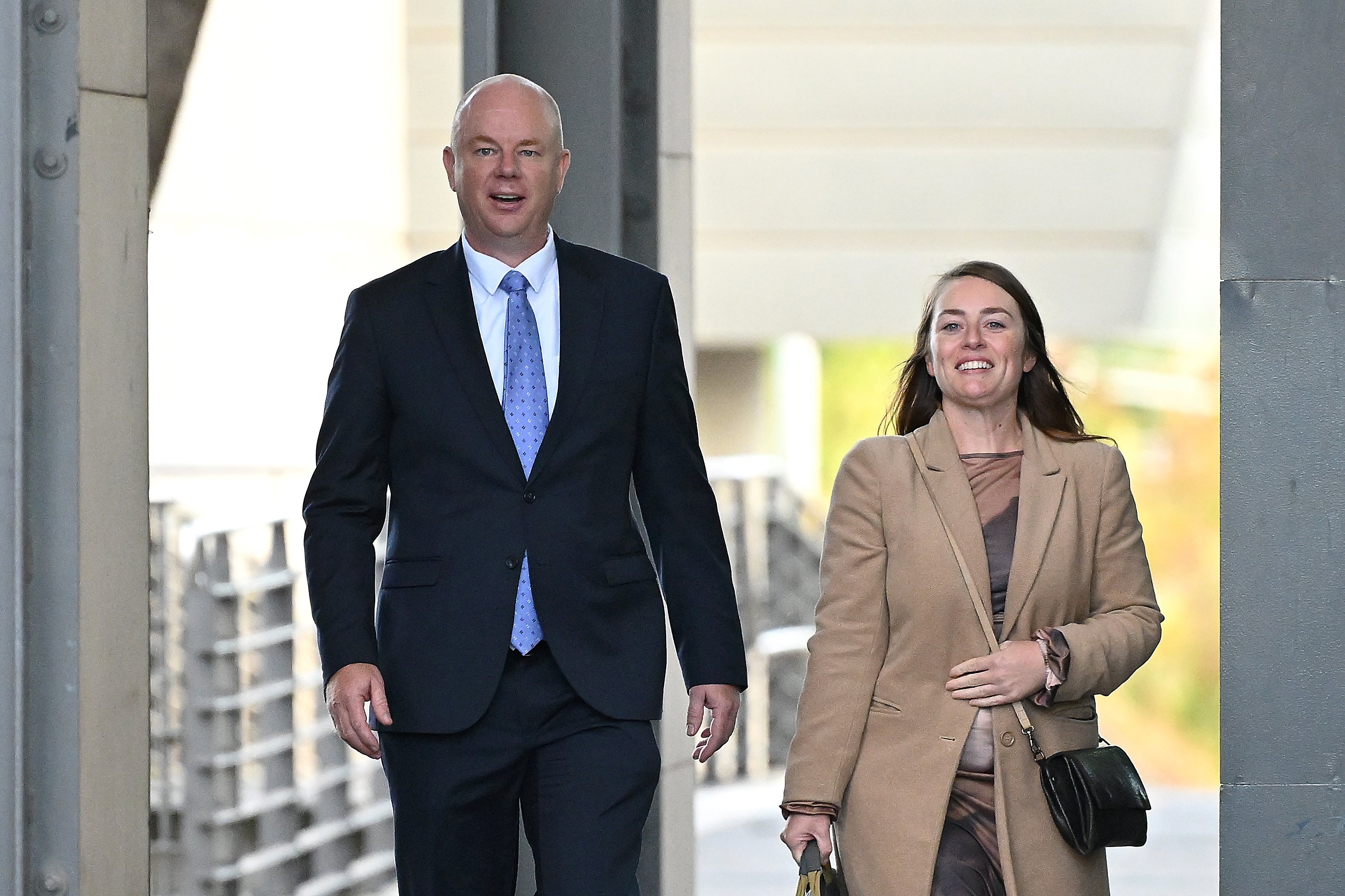 Simon Patterson (L), Erin Patterson's estranged husband, and Jessica O'Donnell depart from the Latrobe Valley Magistrates Court in Morwell, Victoria, Australia, 1 May 2025