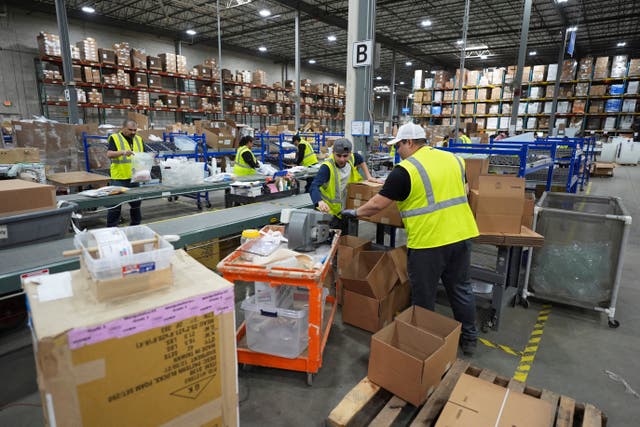 <p>Employees of Learning Resources, an educational toy company, work at a warehouse in Vernon Hills, Ill., Friday, April 11, 2025. (AP Photo/Nam Y. Huh, File)</p>