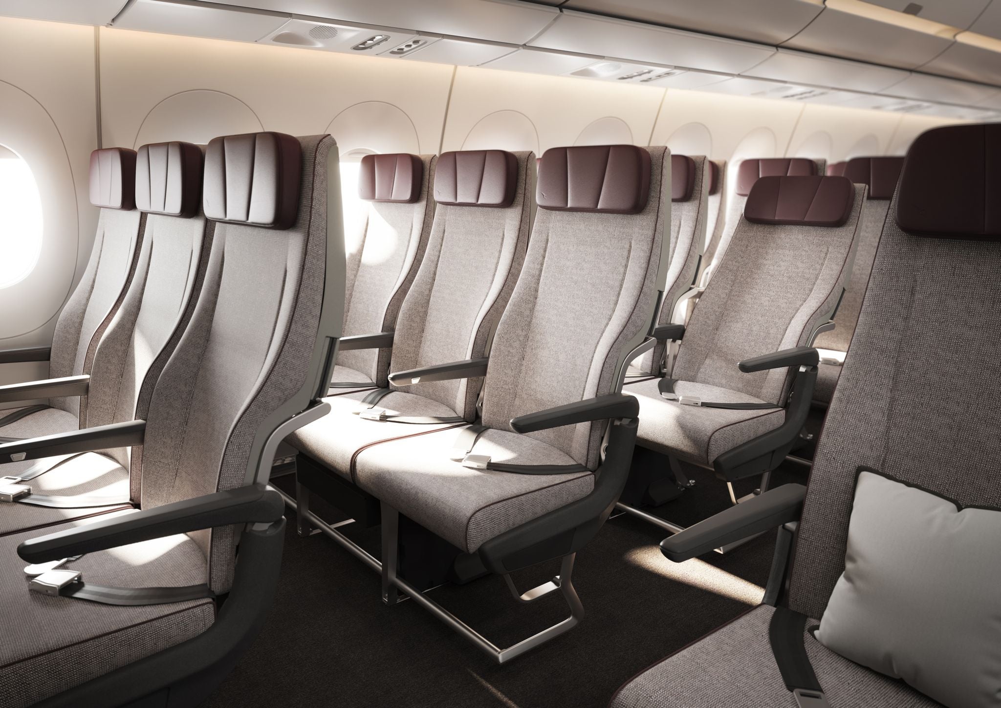 The economy seats are arranged in a 3-3-3 pattern, have a 33-inch pitch and a six-way adjustable headrest