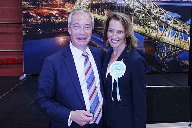 <p>Reform UK’s Sarah Pochin and party leader Nigel Farage talk to the media after the party won the seat in the Runcorn and Helsby by-election</p>