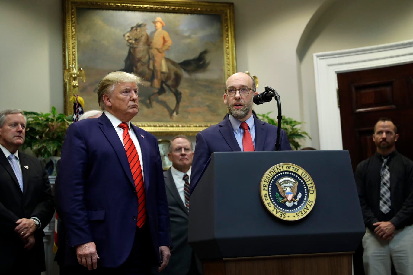 Russell Vought and Donald Trump