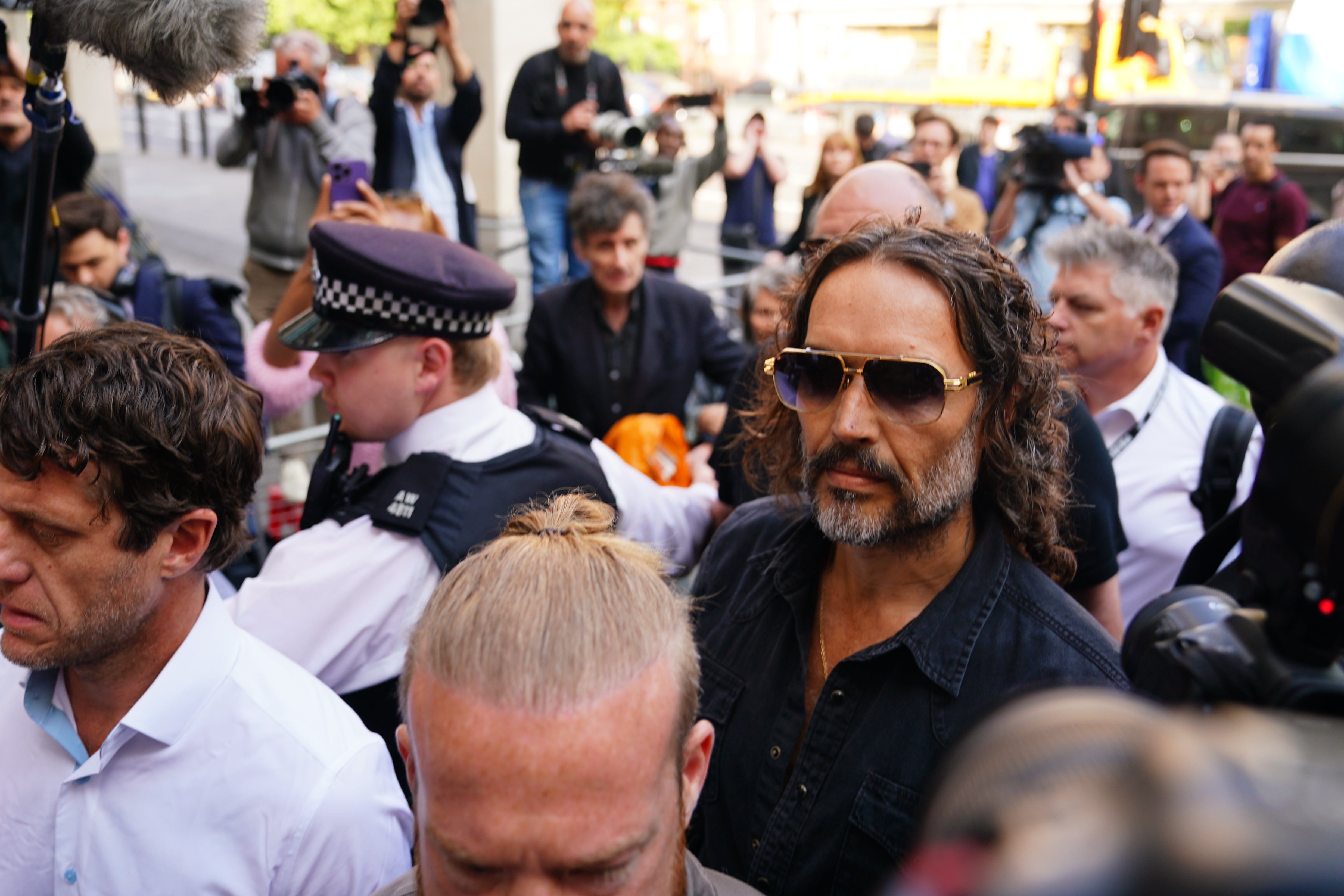 The 49-year-old did not speak to reporters as he walked into Westminster Magistrates’ Court on Friday after flying back to the UK from the US for the hearing.