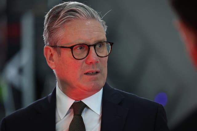 <p>Britain's Prime Minister Keir Starmer speaks with staff members during a visit to a defence contractor in Bedfordshire on May 2, 2025. (Photo by HENRY NICHOLLS / POOL / AFP) (Photo by HENRY NICHOLLS/POOL/AFP via Getty Images)</p>