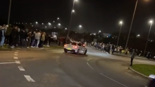Driver who crashed into crowd at car meet left woman seriously injured