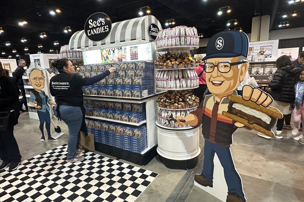 Warren Buffett's profits fall on wildfire losses as thousands line up to listen to him Saturday