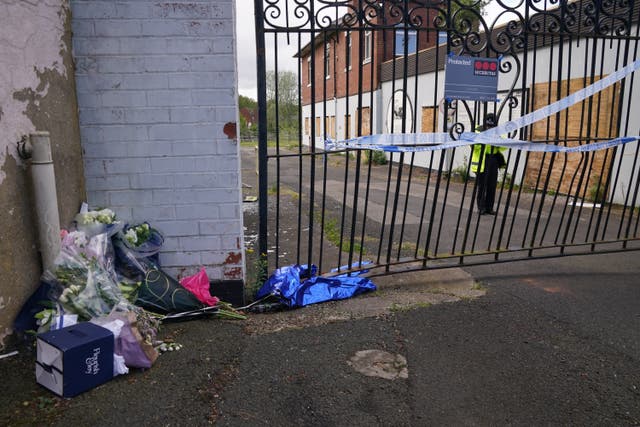 Floral tributes left by the gates of Fairfield Industrial Park in the Bill Quay area of Gateshead (PA)