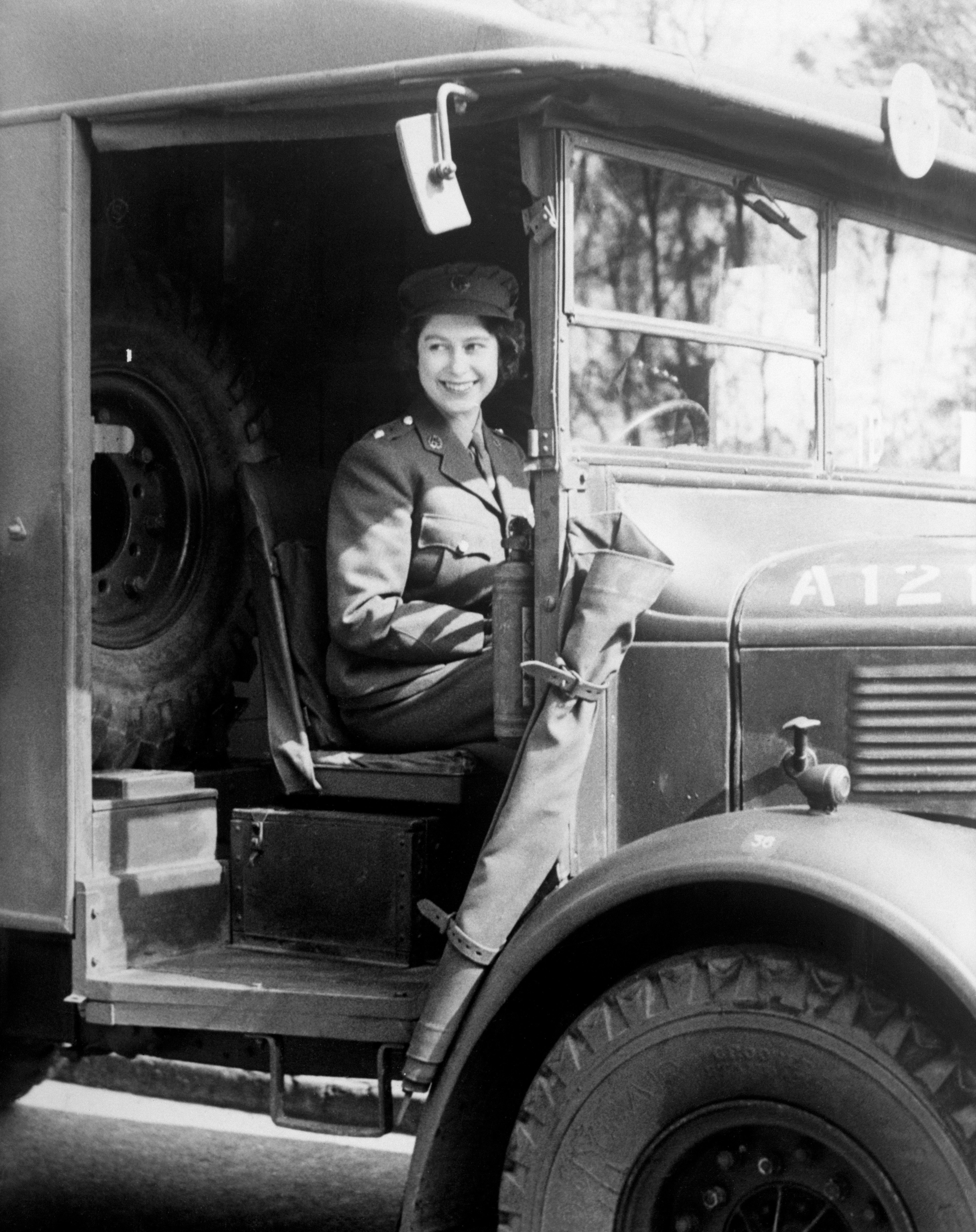 Princess Elizabeth at the wheel of an Army vehicle when she served during the Second World War (PA)