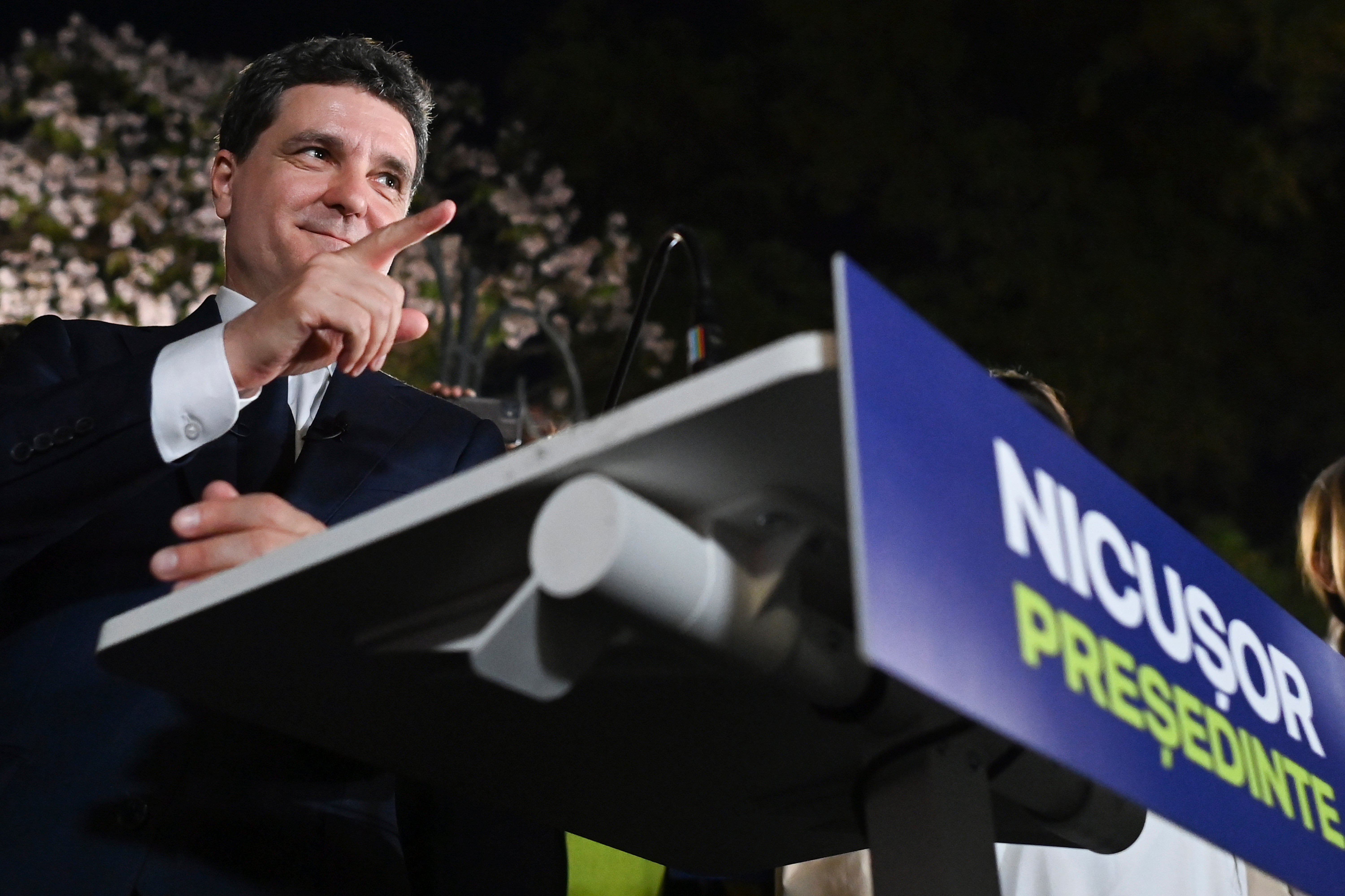 Presidential candidate Nicusor Dan addresses supporters after polls closed for the first round of Romania’s election redo in Bucharest on 4 May 2025