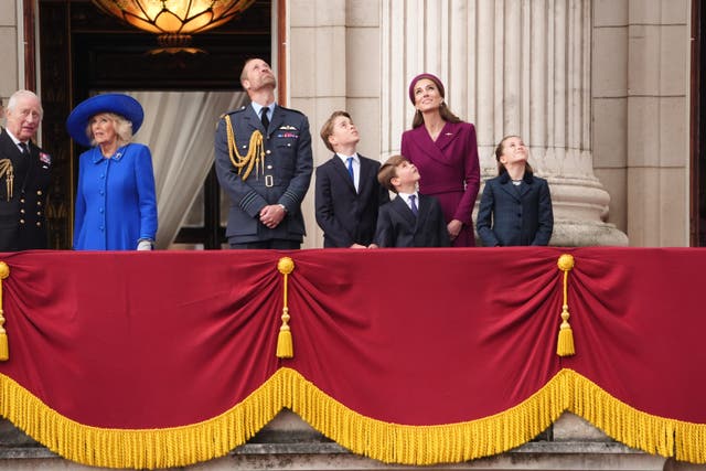 The King, Queen, the Prince of Wales, Prince George, Prince Louis, the Princess of Wales and Princess Charlotte, on the balcony of Buckingham Palace on Monday (Jonathan Brady/PA)
