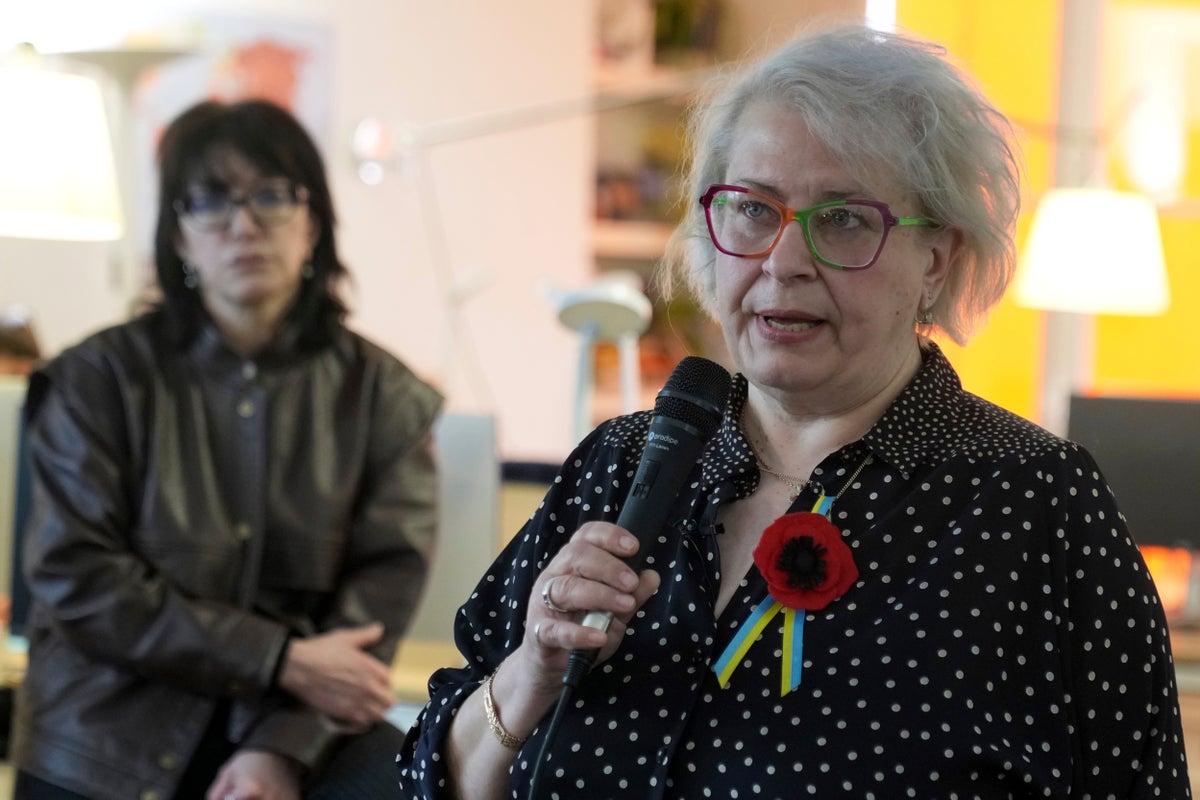 Russian journalist who escaped house arrest in Moscow reappears in Paris after a brutal journey