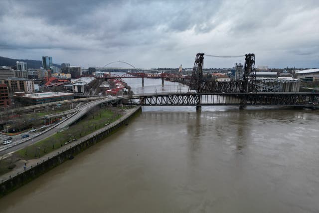 <p>An aerial image shows the Steel Bridge across the Willamette River in Portland, Oregon where several bodies have been recovered in the past month</p>