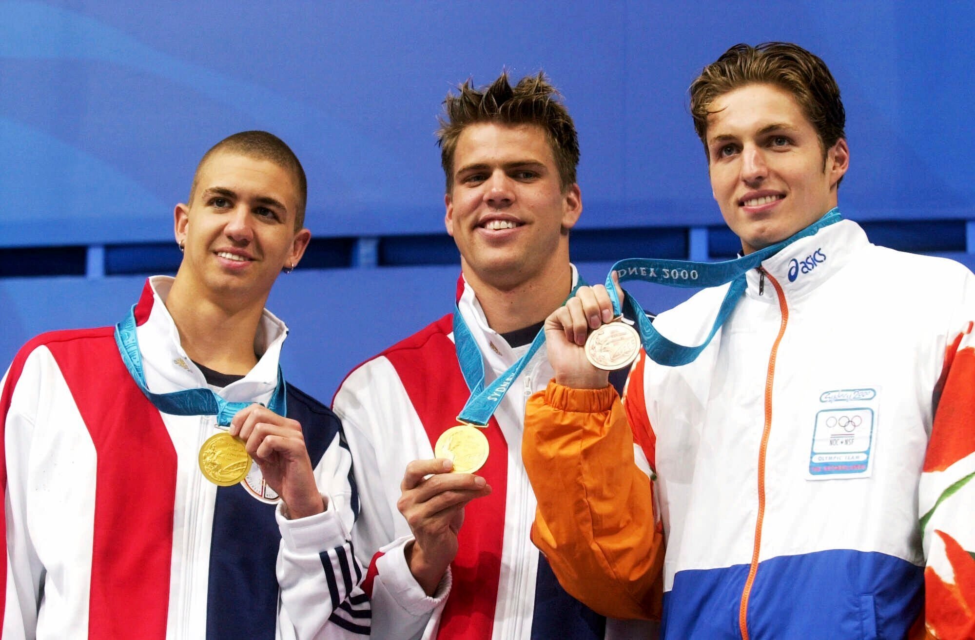 Hall Jr (centre) won his medals across three Olympic Games
