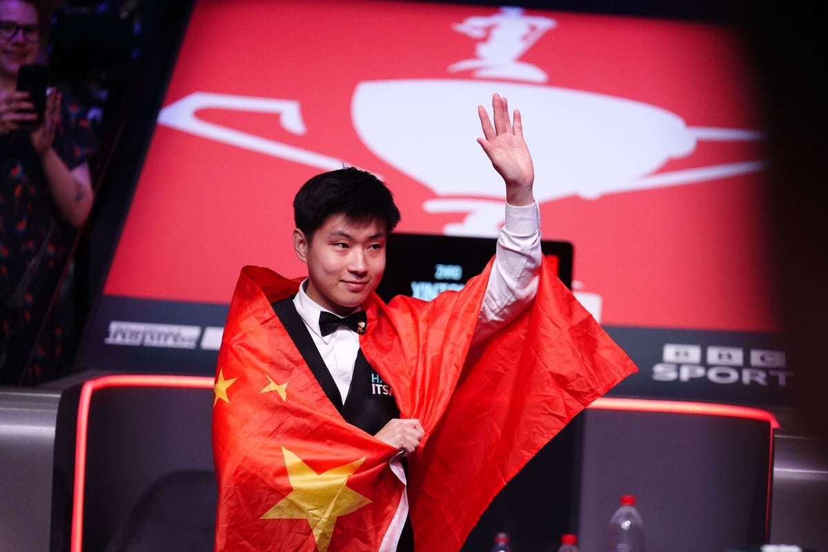 Zhao Xintong endures comeback to be crowned China’s first world snooker champion
