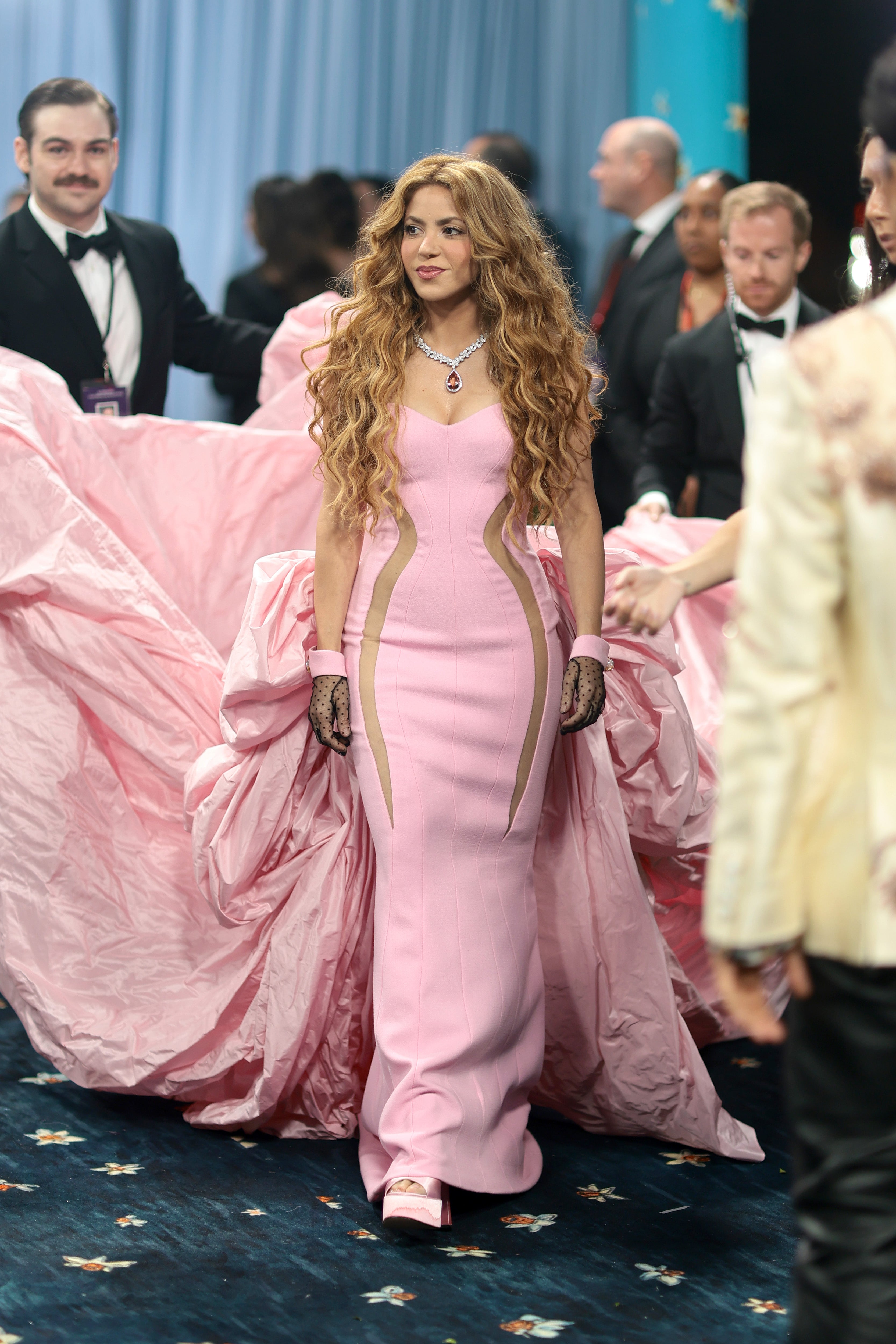 The singer arrived in the feminine outfit that was tailored for her (but not the theme) next to designer Prabal Gurung