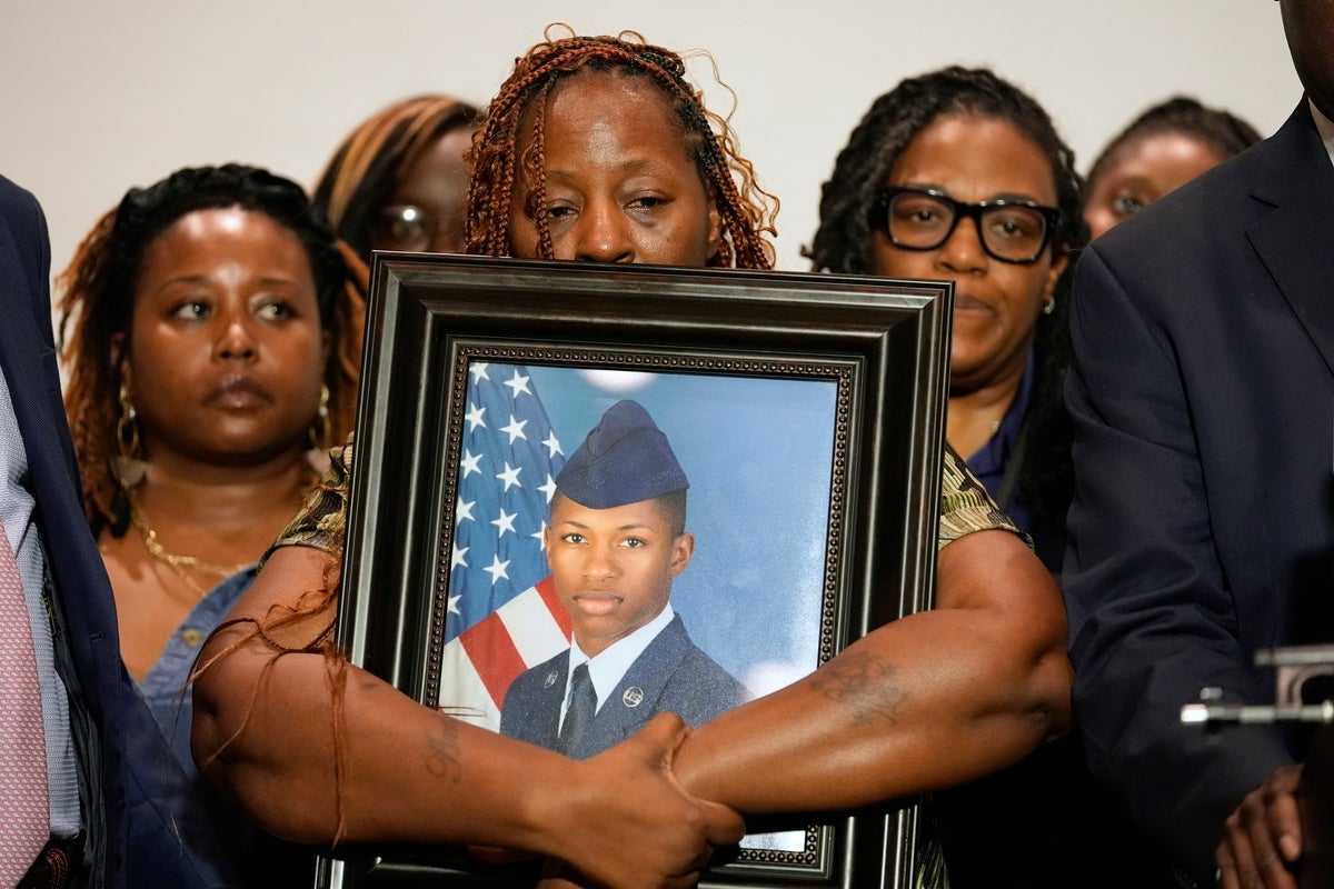 Lawsuit planned over Florida deputy's shooting of US airman who was killed in his own home