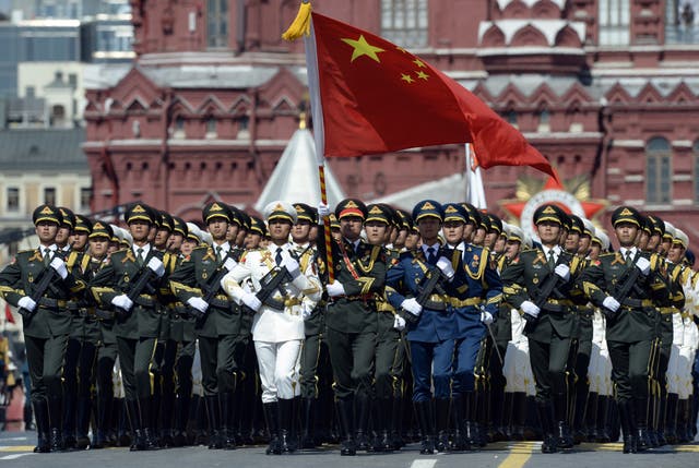 <p>Chinese soldiers march through Red Square during the Victory Day military parade in Moscow in 2015</p>